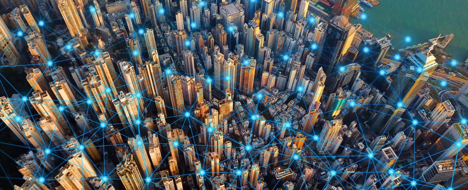 Digital network connection lines of Hong Kong Downtown. Financial district and business centers in smart city in technology concept. Top view of skyscraper and high-rise buildings. Aerial view