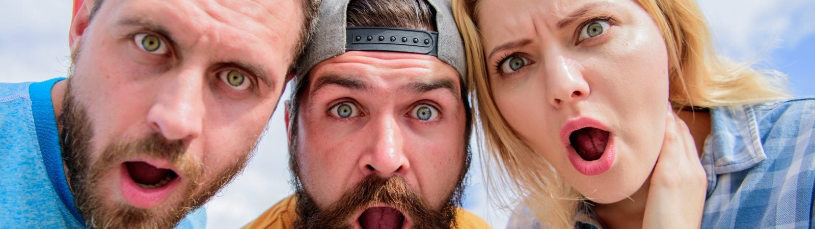 Amazed surprised face expression. How to impress people. Shocking impression. Men with beard and woman looking shocked. No way. Friends shocked faces looking at you. That is impossible. Shocking news.