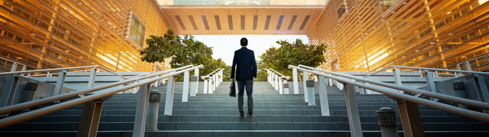 Businessman climbing stairs ,Ambitions concept .