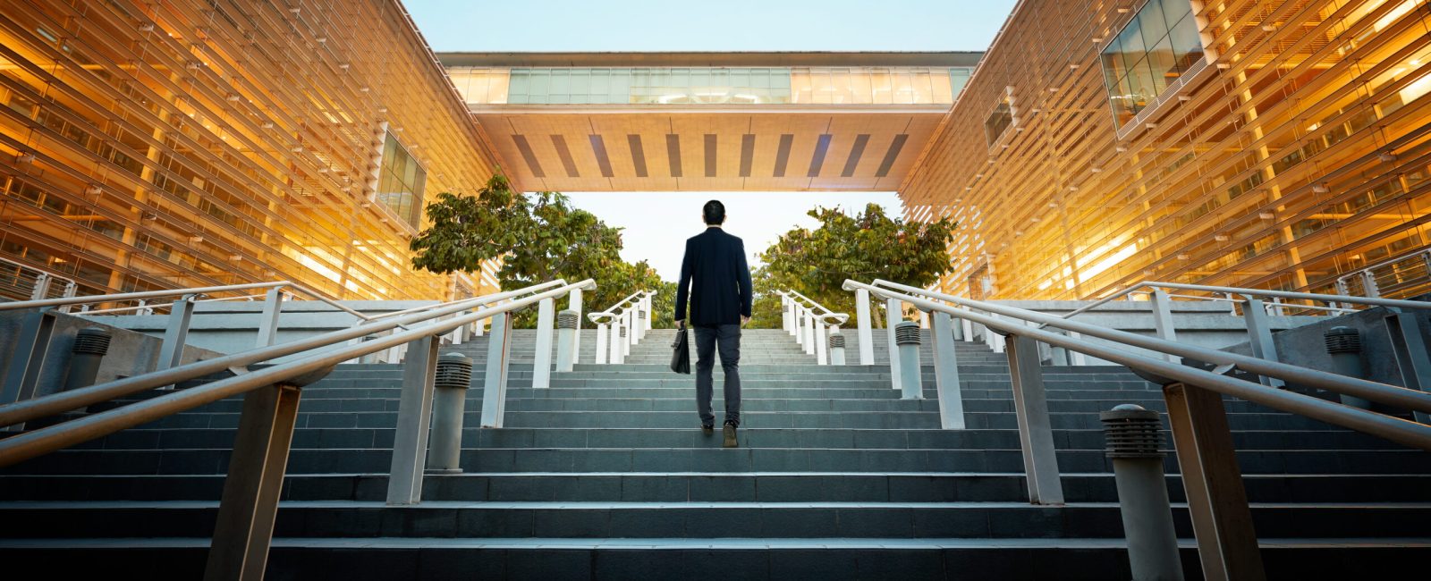 Businessman climbing stairs ,Ambitions concept .