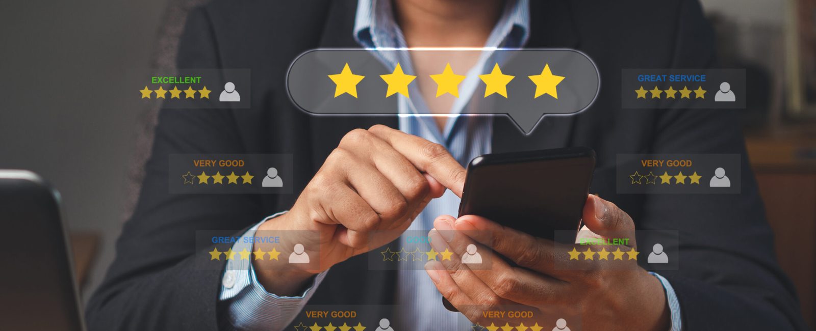 A businesswoman using a smartphone gives the five-star icon a rating of very impressed for service. Customer service and satisfaction surveys concept. Tomboy is a girl who loves to be a man