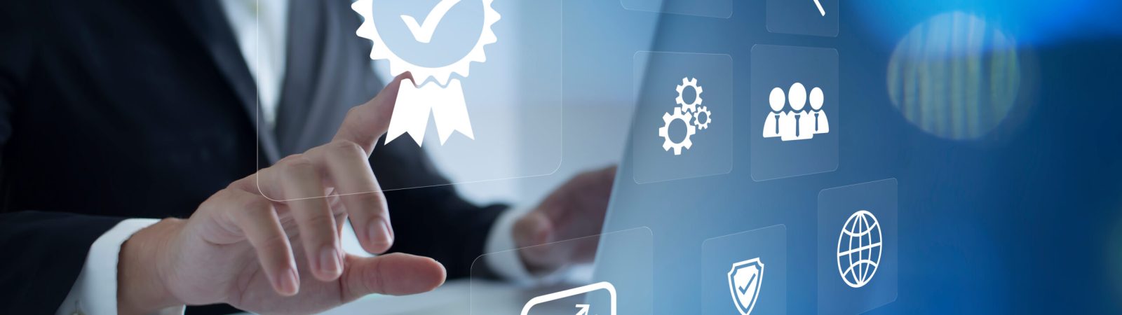 ISO Certification of standards quality control assurance business technology concept. Businessman touching virtual screen iso certification icon to guarantee.