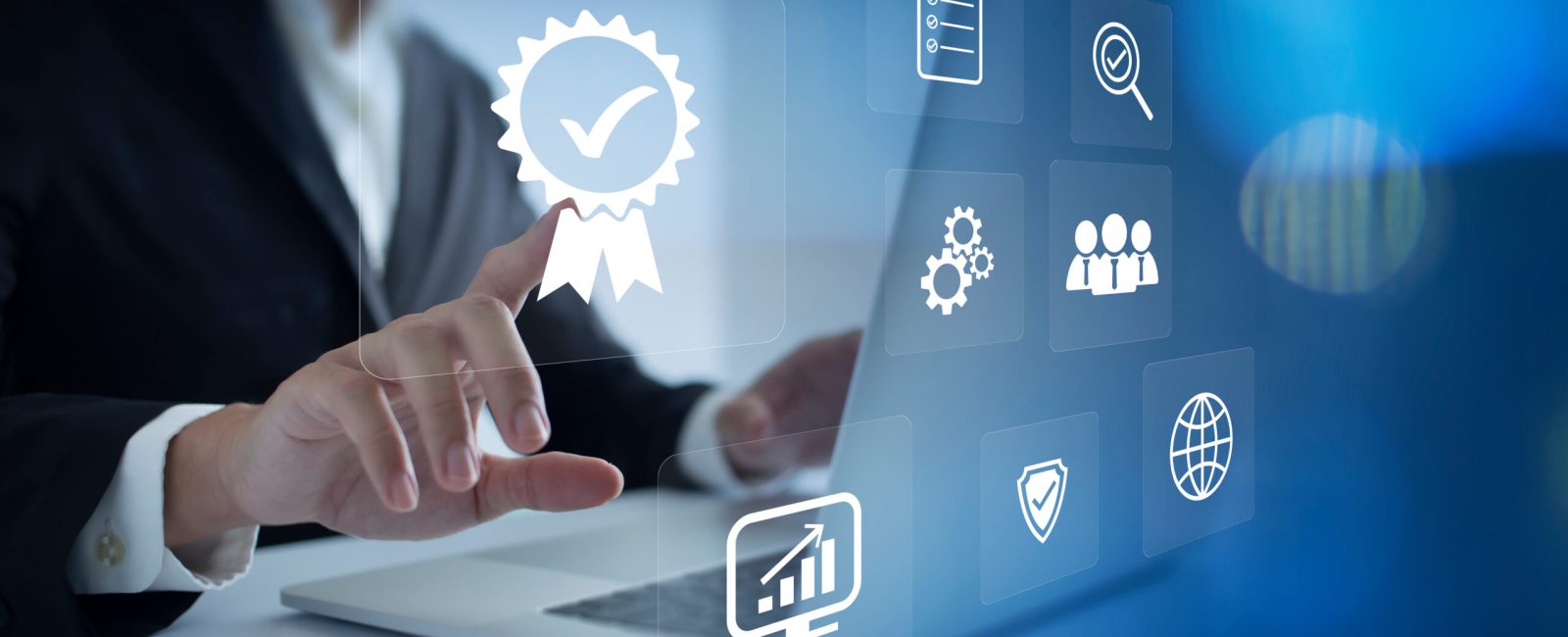 ISO Certification of standards quality control assurance business technology concept. Businessman touching virtual screen iso certification icon to guarantee.